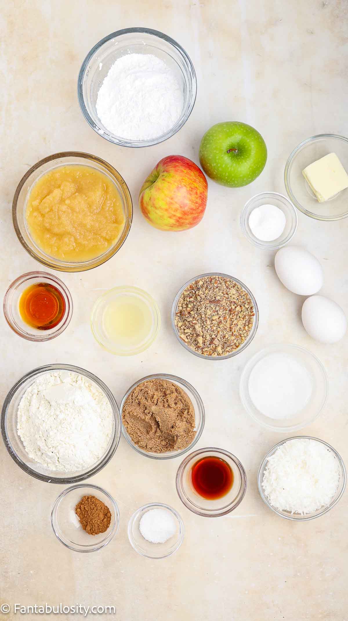 Ingredients to make apple bread sitting on counter.