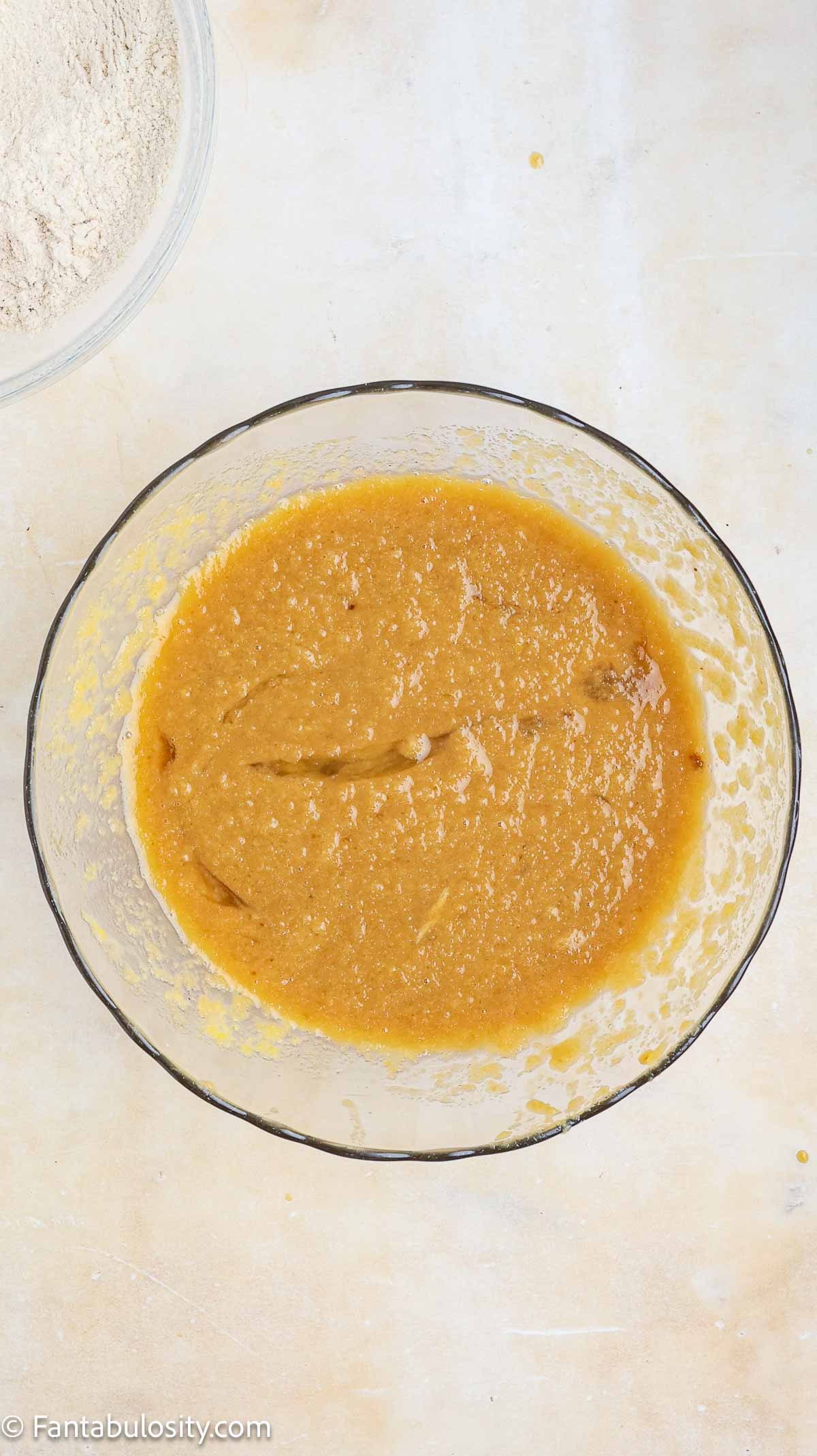Applesauce, eggs, and oil in mixing bowl.