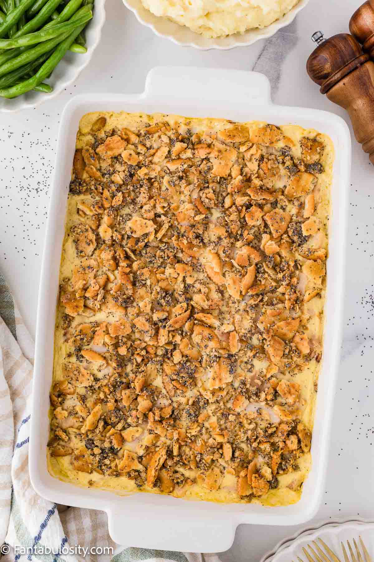 Baked poppy seed chicken casserole in 9x13 baking dish.