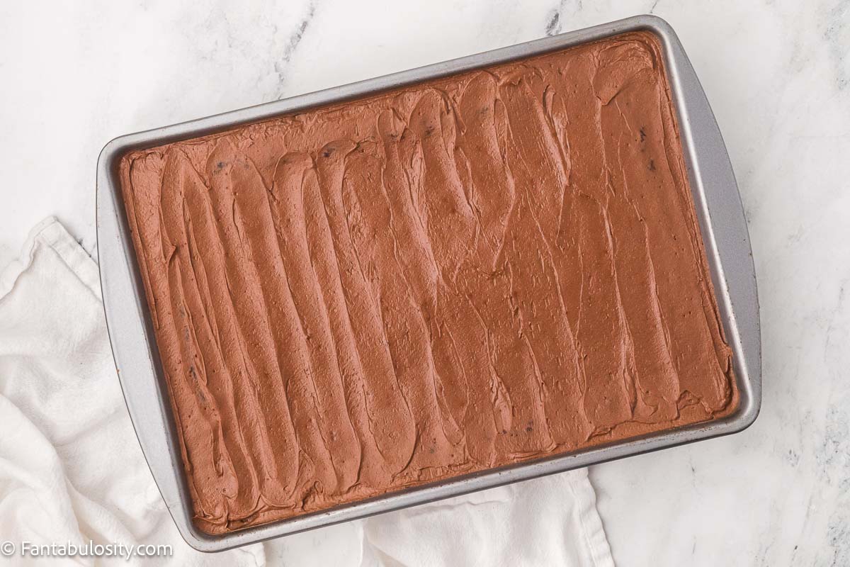 Chocolate mayonnaise cake covered with chocolate frosting in a 9x13-inch pan.