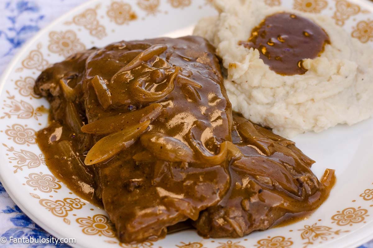 Smothered cube steak and onion gravy served with mashed potatoes.