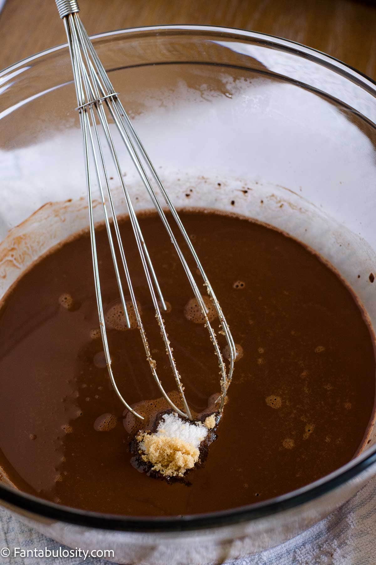 Cocoa powder whisked into boiling water until smooth for chocolate mayonnaise cake.