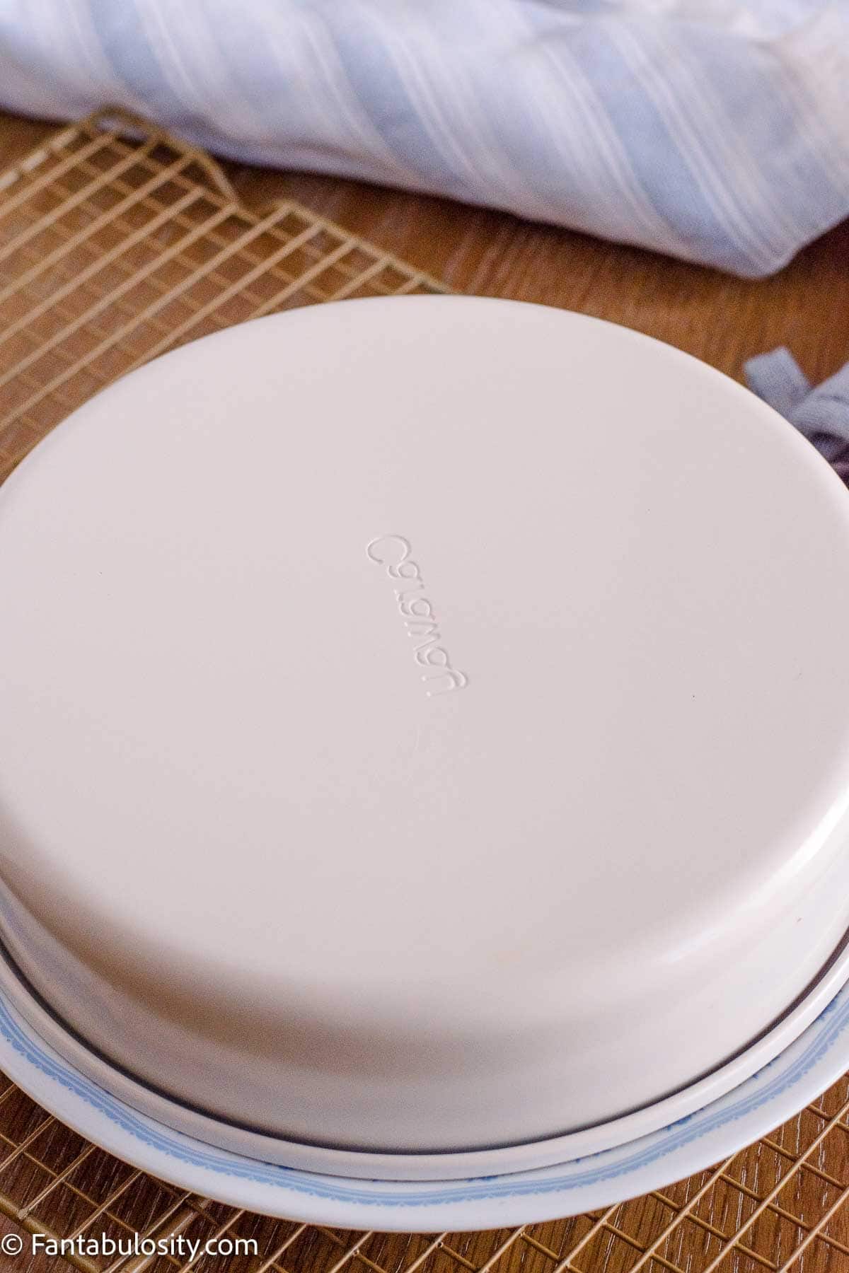 Cake pan inverted onto a serving plate