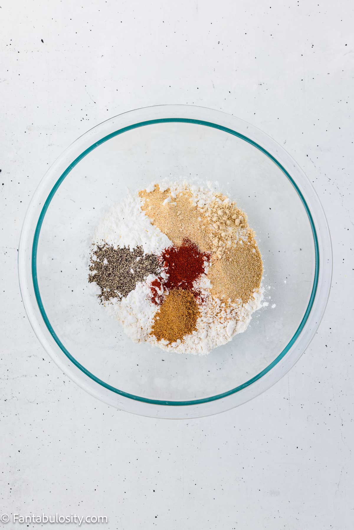 Flour and seasonings in a bowl for the steak-finger coating.