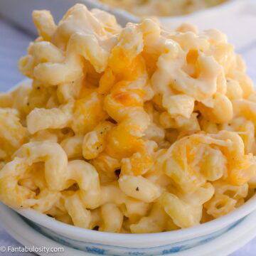 A bowl of Sunday Best Mac and Cheese with creamy cavatappi and melted cheese.